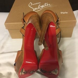 Christian Louboutin ankle sandal.